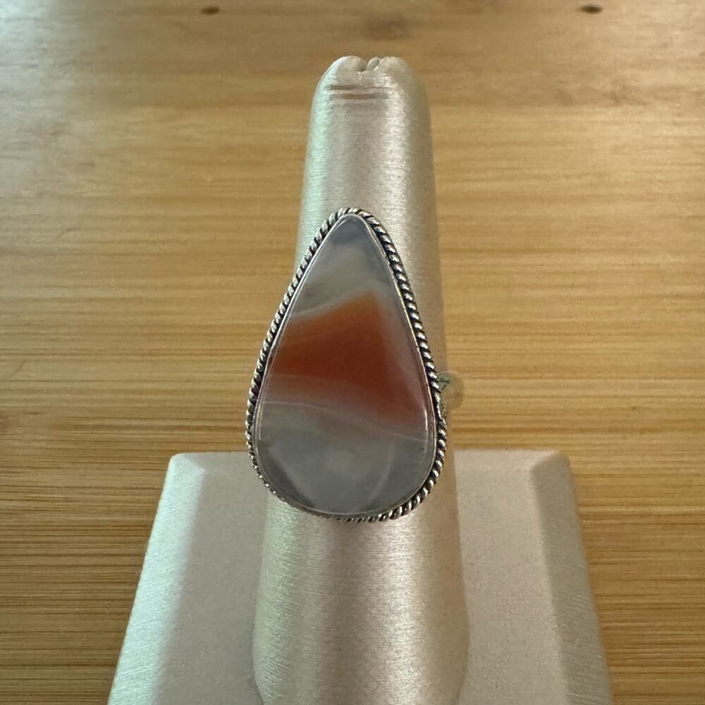 Pear-shaped orange agate ring, size 8
